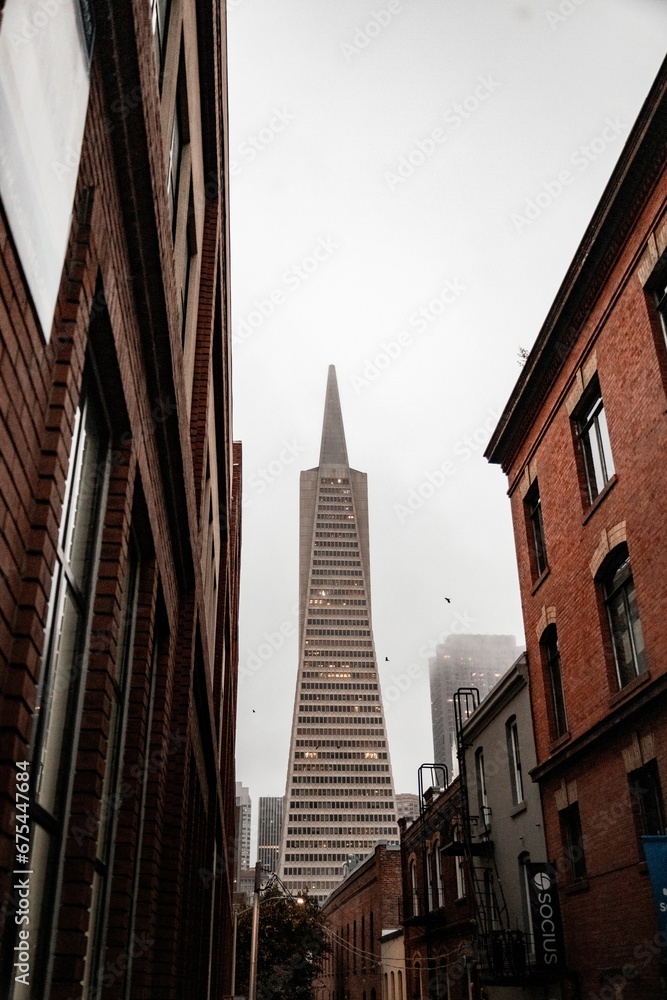 High-rise building with illuminated windows in a misty sky in San Francisco