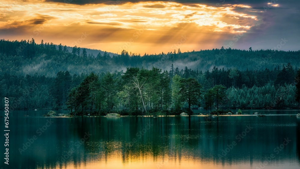 Breathtaking view of a majestic mountain illuminated by a golden sunset, with dramatic dark clouds Breathtaking view of a majestic mountain illuminated by a golden sunset, with dramatic dark clouds