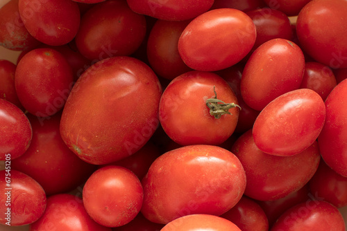 Closeup view of a freshly picked tomatoes  © PumpedVisuals