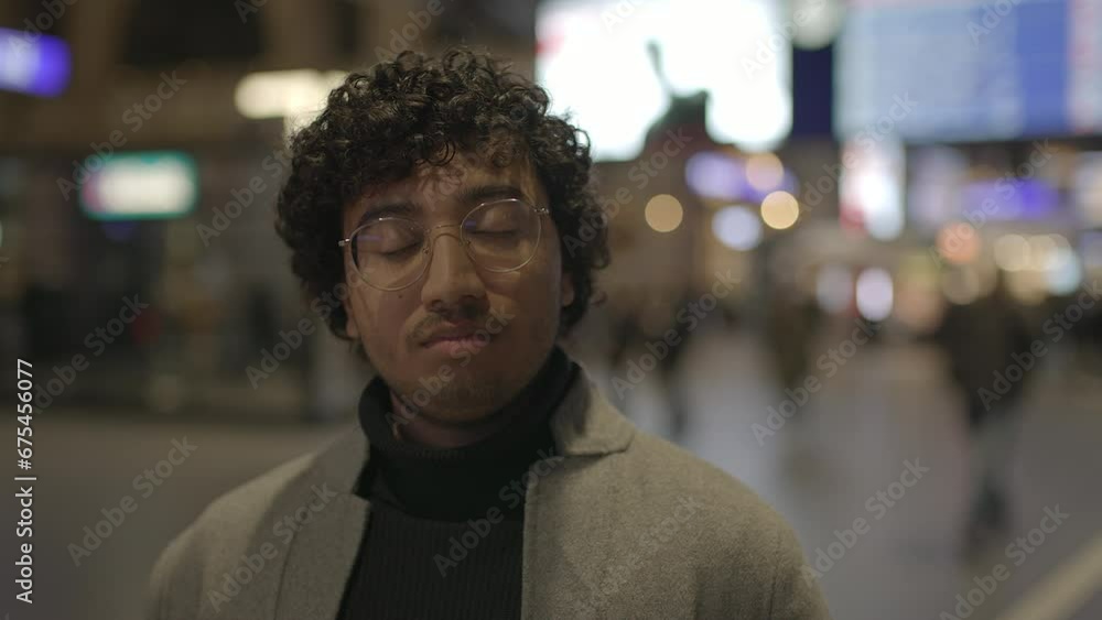 Lifestyle Portrait Of Young Man With Black Curly Hair Inside Train Station Lifestyle Portrait Of Young Man With Black Curly Hair Inside Train Station