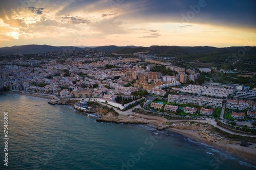 an aerial photo shows the coastline and village of san tela