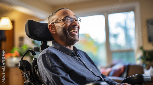 Photo of an Remote worker sitting in a wheelchair and working in working from a home office