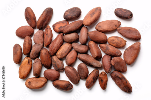 A view of pristine cocoa fruits and moistened/parched cocoa beans placed on a white surface.