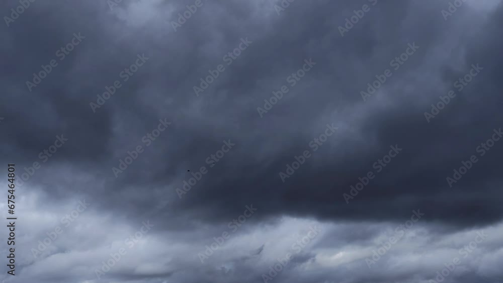 Impressive landscape of a sky whose upper part there is a dark cloud and on the other a grayish cloud Impressive landscape of a sky whose upper part there is a dark cloud and on the other a grayish cloud