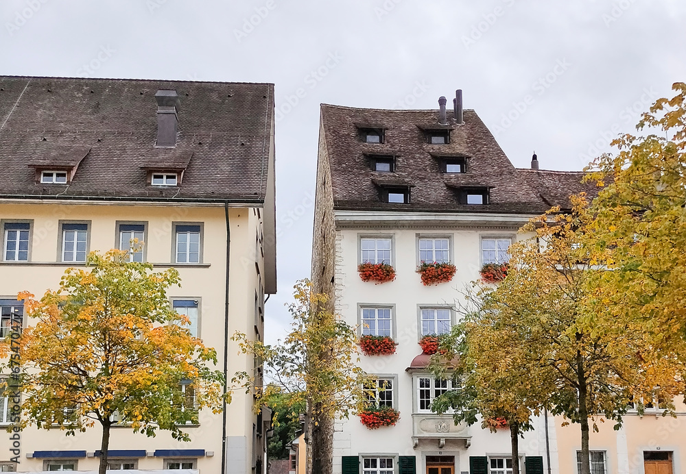 Beautiful facades of historic houses at the old town of Swiss City of Schaffhausen on a foggy winter day. Beautiful facades of historic houses at the old town of Swiss City of Schaffhausen on a foggy winter day.