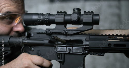 Detail Close-Up of Finger Pulling Trigger on Assault Rifle, Multipel shots in Super Slow-Motion 800 fps