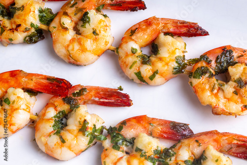 Skewered grilled shrimp wit...