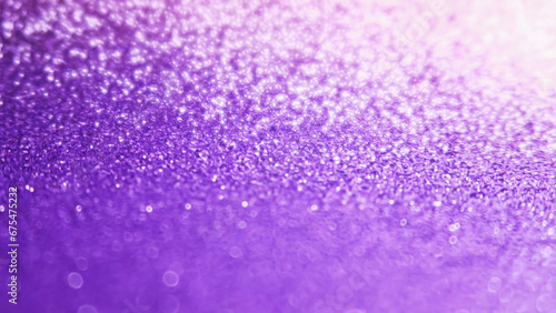 new year sparkling festive background. purple glitter background, selective focus