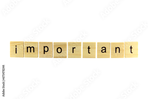 Short word english letter with text "important" on a small wooden cubes block with white background.Copy space concept and selection focus.