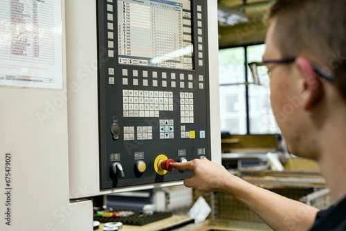 Work and control on a CNC milling and lathe. Setting up, checking and correcting errors in CNC programs. photo
