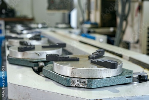 Empty conveyor for continuous supply of workpieces and parts for CNC milling and lathe. photo