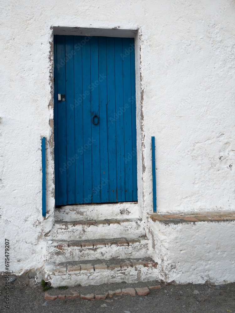 Fototapeta premium Mediterranean house facade with blue door