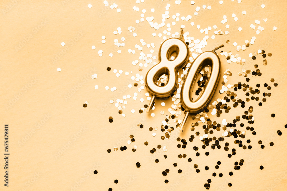 80 years celebration festive background made with golden candles in the ...