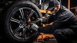Skilled Mechanic at Work: A professional mechanic expertly handles tire replacement in an automotive repair garage, ensuring vehicles are equipped with the right tires for the season.