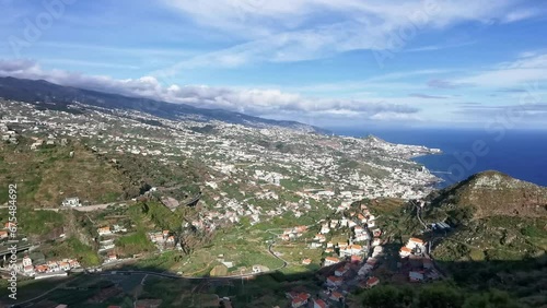 Madeira Island Portugal - 04 21 2023: Full panoramic aerial view of the city of Funchal and Câmara de Lobos, tourist and iconic city on the island of Madeira, in Portugal photo