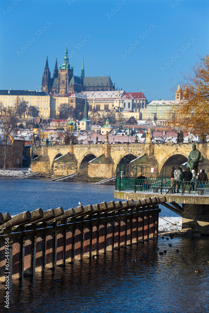 Obraz premium architecture, Czech, gothic, history, medieval, Snowy Prague Lesser Town with Prague Castle and Charles Bridge above River Vltava in the sunny Day , Czech republic
