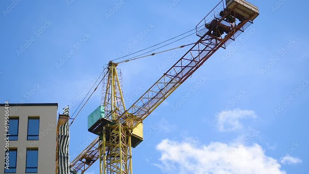 construction crane on the construction site, a new high-rise building is being built construction crane on the construction site, a new high-rise building is being built