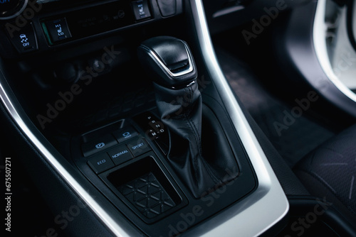 Modern black car interior, climate control, air ducts, deflectors on the car panel. Details interior. 