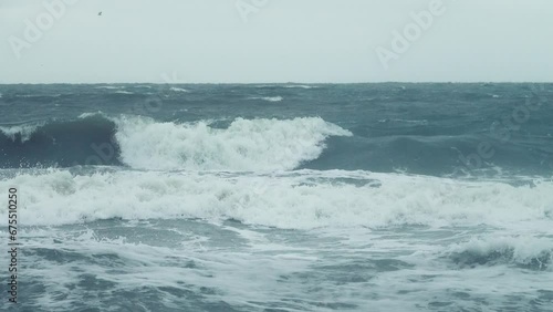 A spring medium-strength storm on shallow Sea of Azov. The barrier beach Arabatskaya Strelka stretches for 100 km photo