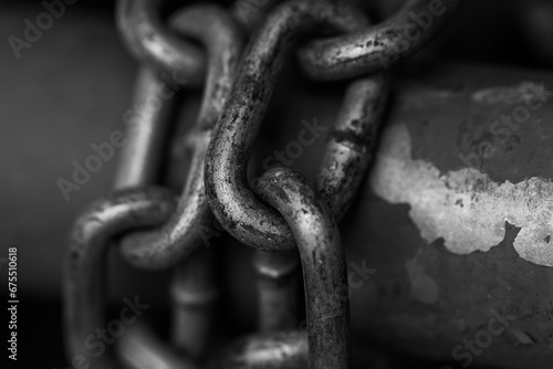 Black and white photo of a metal chain