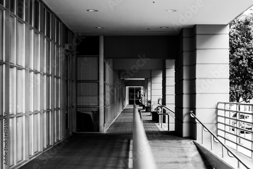 Canvastavla Black-and-white image of a long, dimly-lit corridor with a narrow passageway