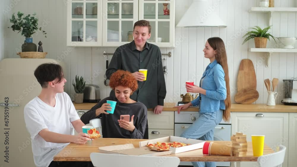 Home party. Friends spending time together having fun laughing communicating at home. Happy diverse group eating pizza drinking beer or lemonade. Mixed race young buddies best friends enjoying weekend Home party. Friends spending time together having fun laughing communicating at home. Happy diverse group eating pizza drinking beer or lemonade. Mixed race young buddies best friends enjoying weekend