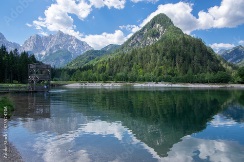 Lake called Jasna in European Slovenian Julian Alps  beautiful water surface with reflections near the road to Vrsic Pass