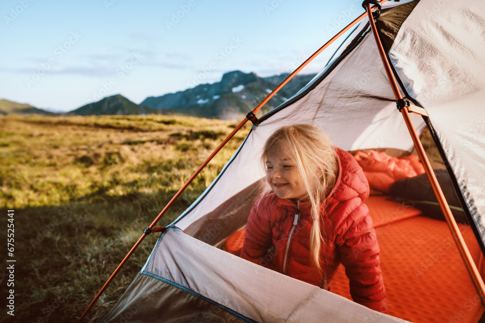 Child traveling with camping tent gear active family vacations kid hiking outdoor healthy lifestyle adventure trip exploring mountains of Norway - obrazy, fototapety, plakaty 