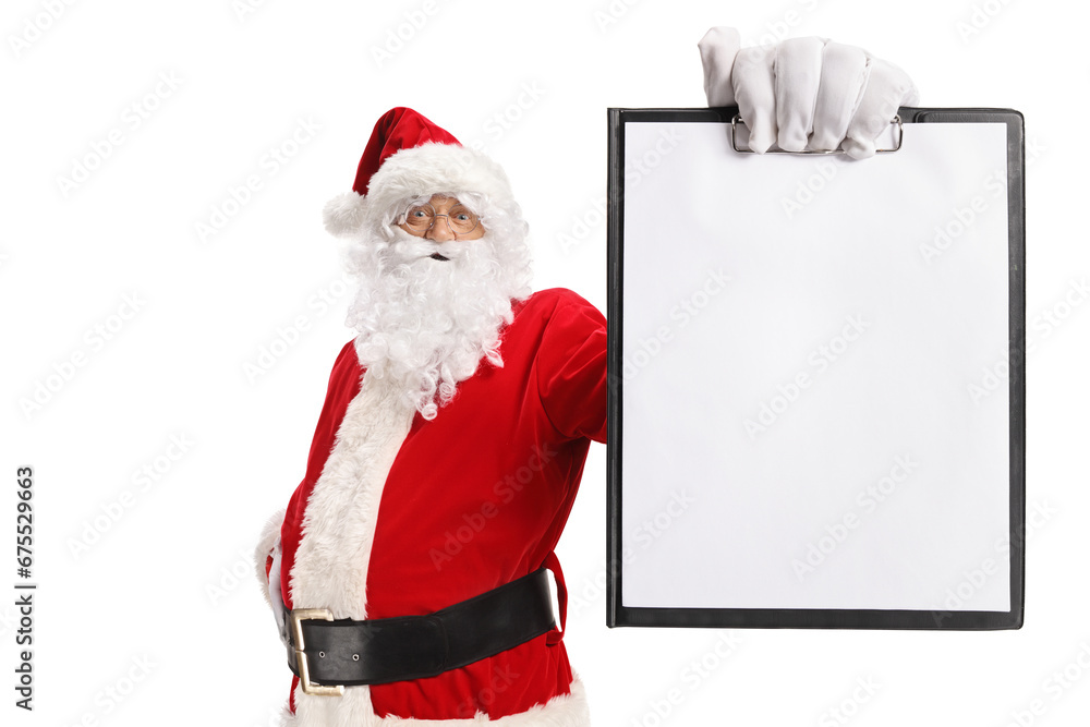 Naklejka premium Santa claus holding a blank paper on a clipboard