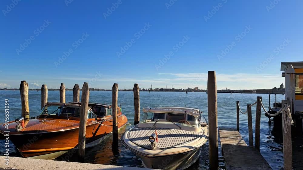 Beautiful seascape with gondolas on the blue sea water in Venice Beautiful seascape with gondolas on the blue sea water in Venice