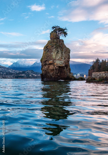 Seawall in Stanley Park. Cloudy Sunrise in Winter. Downtown Vancouver