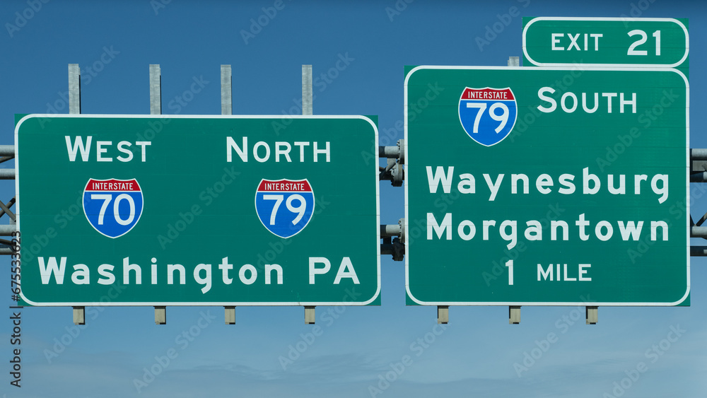 signs for Exit 21 on Interstate70 for Interstate 79 South toward Waynesburg and Morgantown, and continuing on I70 West and I79 North