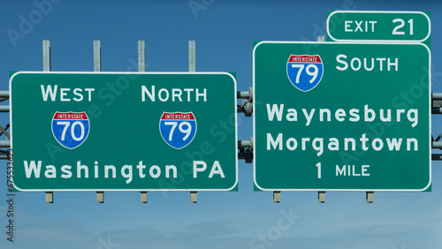 signs for Exit 21 on Interstate70 for Interstate 79 South toward Waynesburg and Morgantown, and continuing on I70 West and I79 North photo