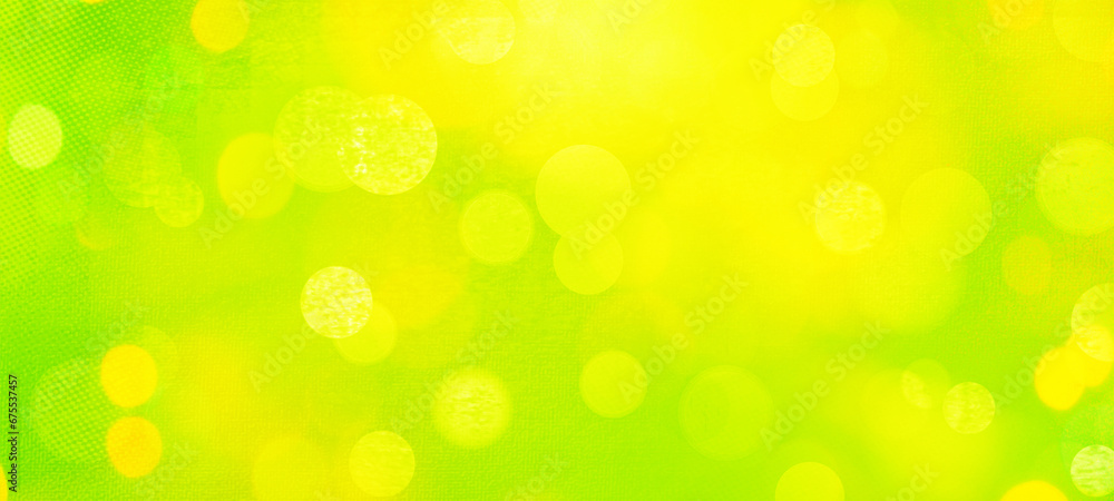 Yellow bokeh widescreen background for seasonal, holidays, event and celebrations Yellow bokeh widescreen background for seasonal, holidays, event and celebrations