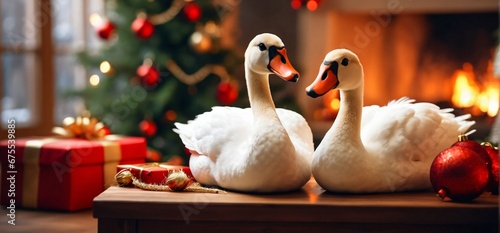 Fototapeta Naklejka Na Ścianę i Meble -  Two beautiful white swans pose on a red Christmas background. Christmas tree in the background. Digital painting illustration. Generative AI