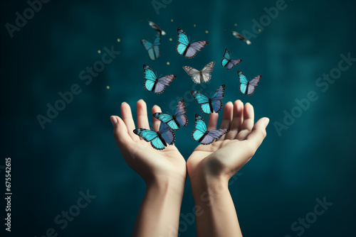 A creative display of women's hands releasing butterflies, representing freedom and transformation, creativity with copy space