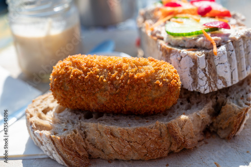 Dutch fast food, deep fried croquettes filled with ground beef meat served on bread