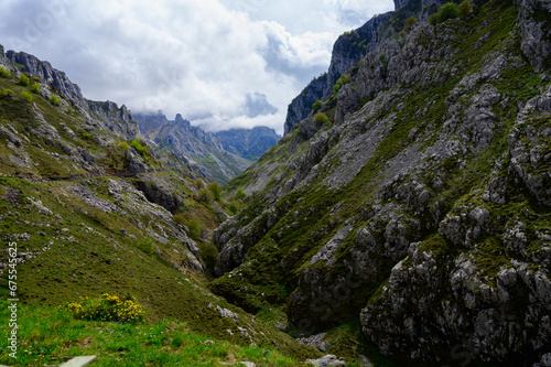 Driving narrow mountain road from Los Arenas to remote mountain village Sotres, Picos de Europa mountains, Asturias, North of Spain
