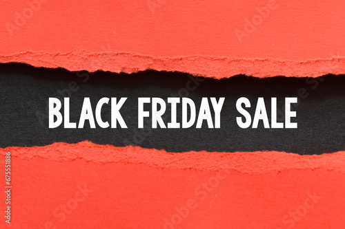 BLACK FRIDAY SALE words on a black piece of paper. November is promotion time in stores and online.