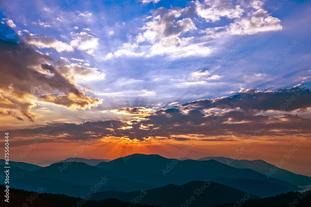 Fototapeta premium bright sunny dawn in the mountains