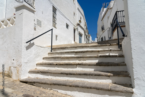 Beautiful street in the historical center of the white beautiful village of Vejer de la Frontera in a sunny day, Cadiz province, Andalusia, Spain © JoseLuis