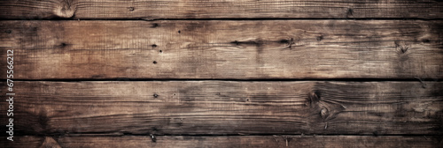 Vintage wood planks texture background, rough weathered wooden boards with nails. Panoramic wide banner of old dark barn wall. Theme of rustic design, nature, material, grunge photo