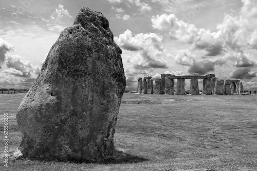 Stonehenge is a prehistoric monument on Salisbury Plain in Wiltshire. It consists of an outer ring of vertical sarsen standing stones. Inside is a ring of smaller bluestones. photo