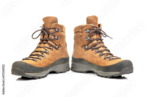 Trekking boots for hiking on a white background. Equipment for travel and hiking