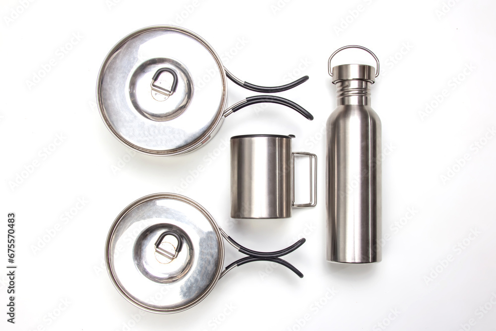 the set of metal utensils for tourism on a white background the set of metal utensils for tourism on a white background