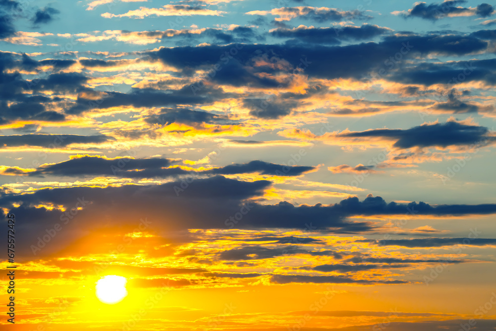 brightly colorful clouds in the evening sky. Lush colored clouds in the sky before sunset. dawn in the clouds brightly colorful clouds in the evening sky. Lush colored clouds in the sky before sunset. dawn in the clouds