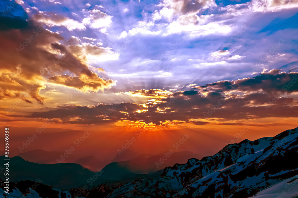 Fototapeta premium bright sunny dawn in the mountains