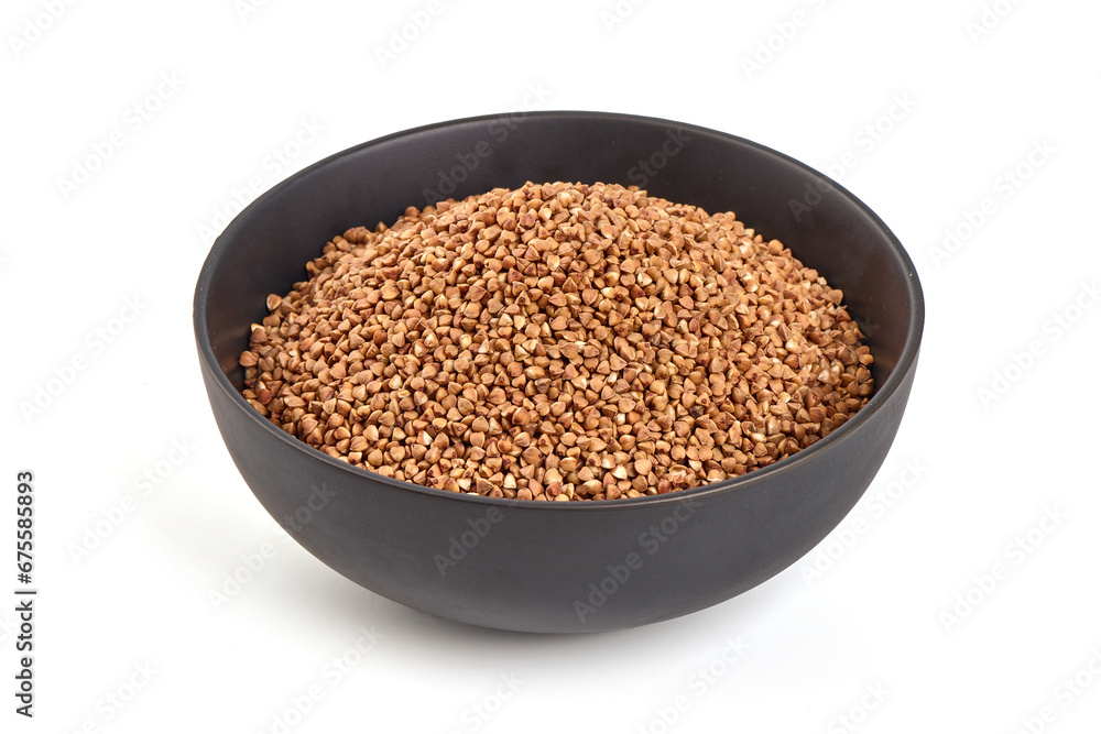 Raw buckwheat grains, isolated on white background. Raw buckwheat grains, isolated on white background.