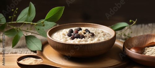 I enjoy starting my day with a warm bowl of nutritious porridge made from organic wheat as the earthy aroma of the wooden spoon mixes with the comforting background of nature creating a soot