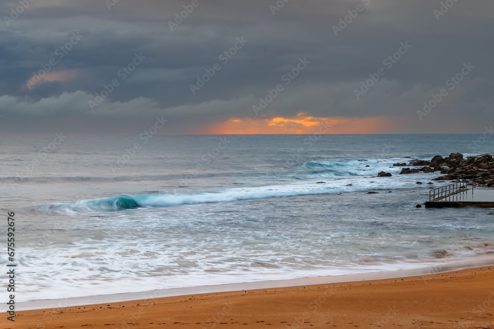 Wet weather sunrise seascape
